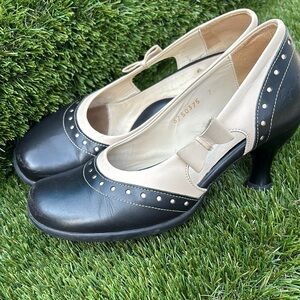 John Fluevog Black and Cream Heels with Bow Detail